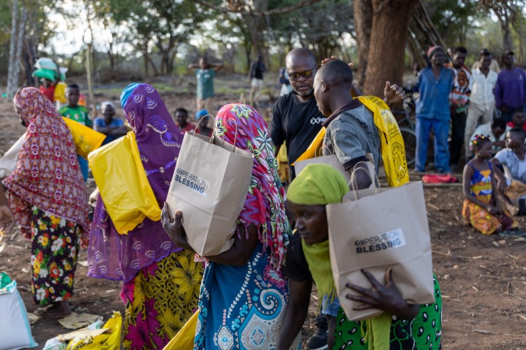 Refugees receiving food parcels