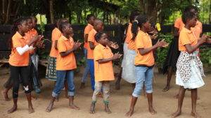 Janete with her peers dancing